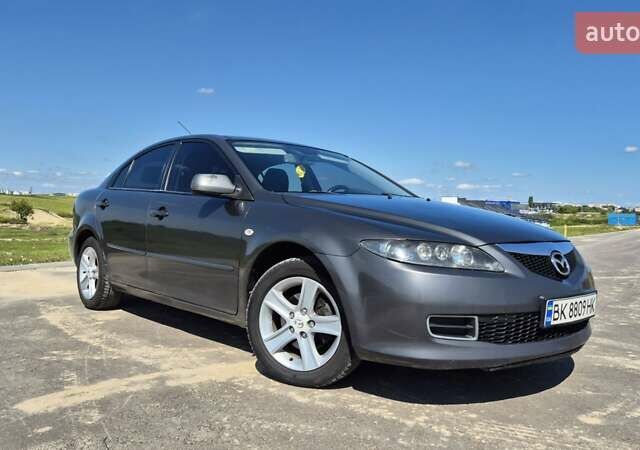 Сірий Мазда 6, об'ємом двигуна 2 л та пробігом 435 тис. км за 4300 $, фото 2 на Automoto.ua