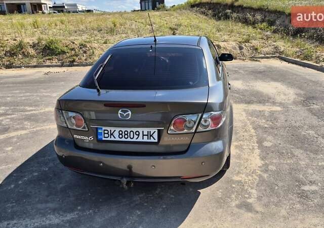 Сірий Мазда 6, об'ємом двигуна 2 л та пробігом 435 тис. км за 4300 $, фото 8 на Automoto.ua
