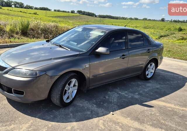 Сірий Мазда 6, об'ємом двигуна 2 л та пробігом 435 тис. км за 4300 $, фото 12 на Automoto.ua
