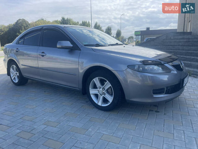Серый Мазда 6, объемом двигателя 2 л и пробегом 168 тыс. км за 6200 $, фото 2 на Automoto.ua