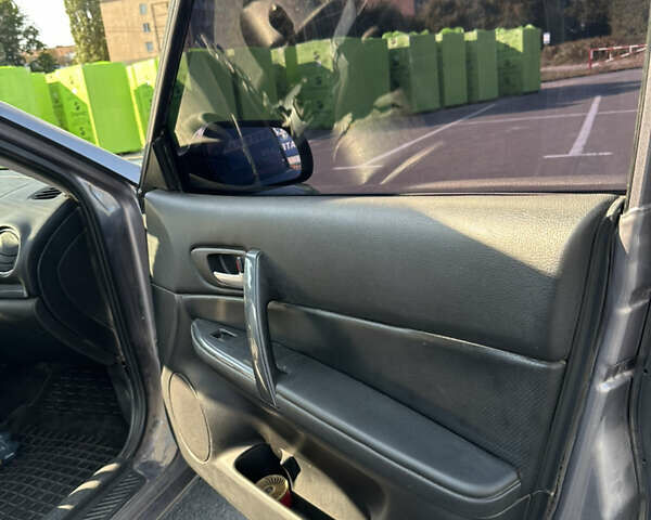 Сірий Мазда 6, об'ємом двигуна 2 л та пробігом 284 тис. км за 3500 $, фото 13 на Automoto.ua