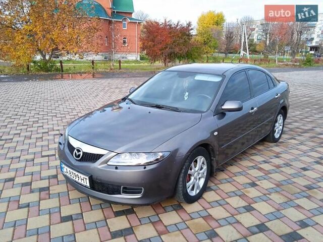 Серый Мазда 6, объемом двигателя 1.8 л и пробегом 196 тыс. км за 5200 $, фото 2 на Automoto.ua