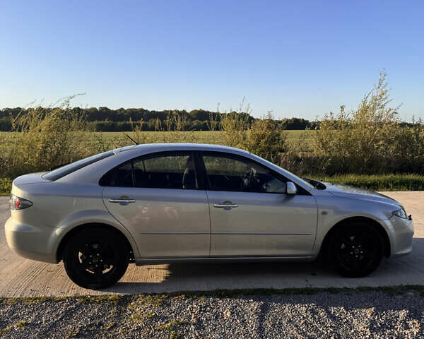 Серый Мазда 6, объемом двигателя 2 л и пробегом 238 тыс. км за 4250 $, фото 2 на Automoto.ua