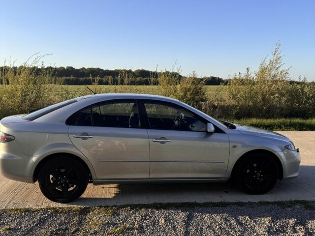 Серый Мазда 6, объемом двигателя 2 л и пробегом 238 тыс. км за 4250 $, фото 4 на Automoto.ua