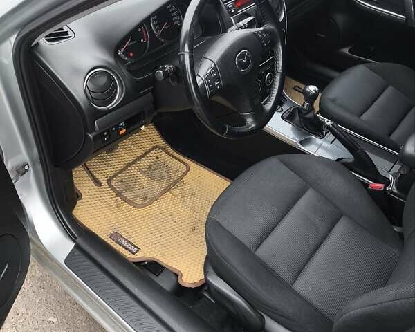 Серый Мазда 6, объемом двигателя 2 л и пробегом 233 тыс. км за 5500 $, фото 5 на Automoto.ua