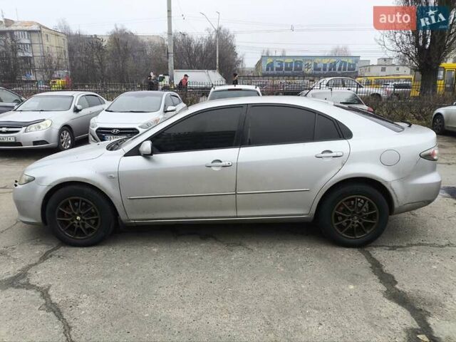 Серый Мазда 6, объемом двигателя 2 л и пробегом 233 тыс. км за 5500 $, фото 1 на Automoto.ua