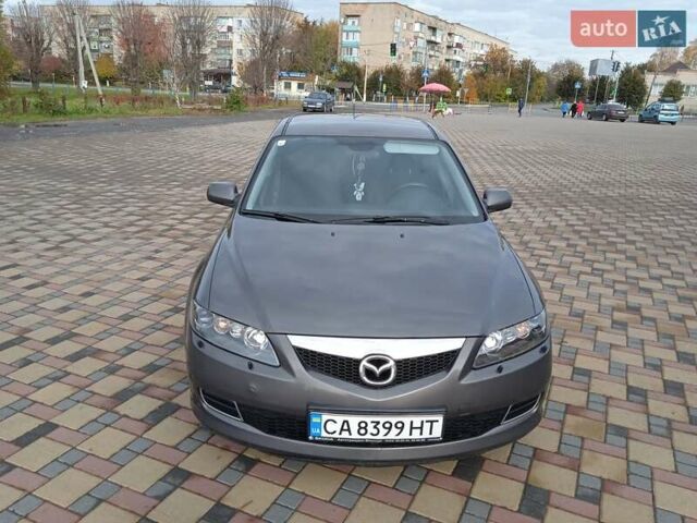 Серый Мазда 6, объемом двигателя 1.8 л и пробегом 196 тыс. км за 5200 $, фото 1 на Automoto.ua
