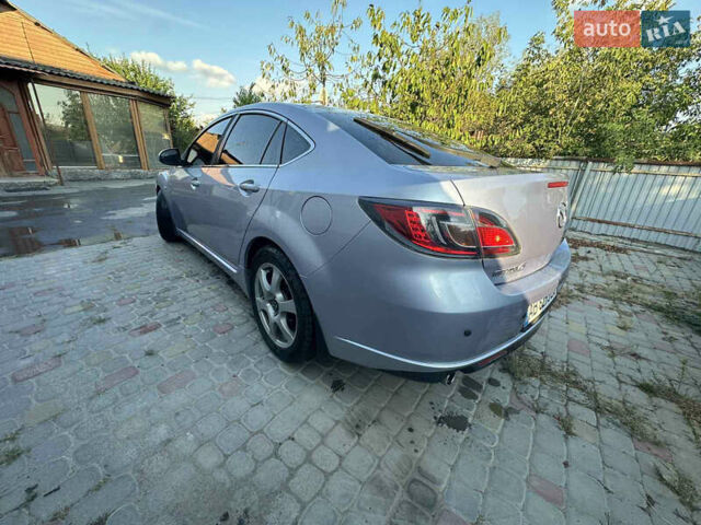 Серый Мазда 6, объемом двигателя 2 л и пробегом 246 тыс. км за 7100 $, фото 2 на Automoto.ua