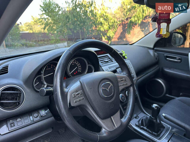 Серый Мазда 6, объемом двигателя 2 л и пробегом 246 тыс. км за 7100 $, фото 5 на Automoto.ua