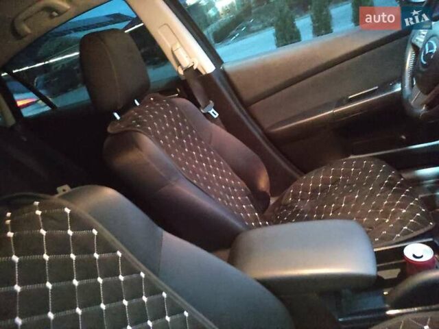 Серый Мазда 6, объемом двигателя 1.8 л и пробегом 301 тыс. км за 5700 $, фото 9 на Automoto.ua