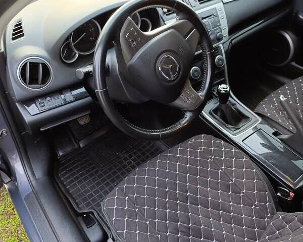 Серый Мазда 6, объемом двигателя 2 л и пробегом 310 тыс. км за 6700 $, фото 3 на Automoto.ua