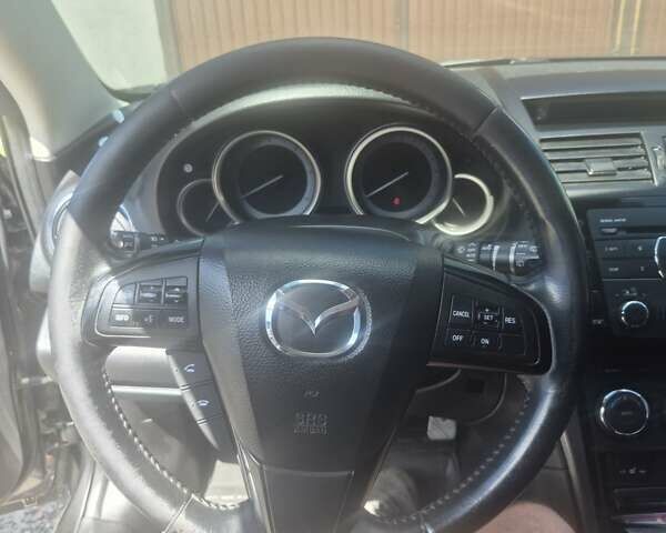 Серый Мазда 6, объемом двигателя 2.18 л и пробегом 245 тыс. км за 8300 $, фото 3 на Automoto.ua