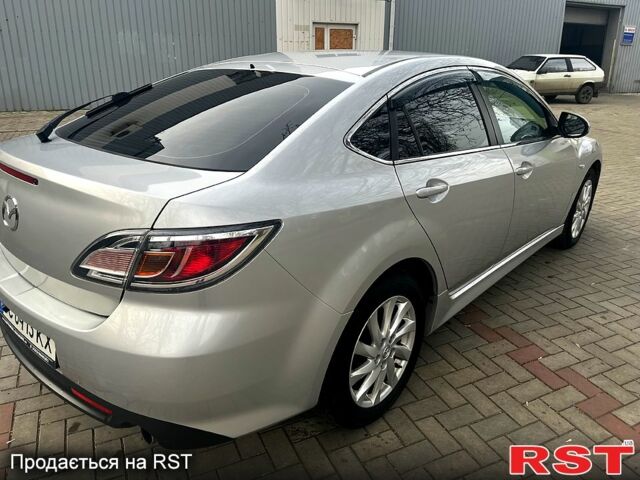 Серый Мазда 6, объемом двигателя 22 л и пробегом 295 тыс. км за 7299 $, фото 1 на Automoto.ua