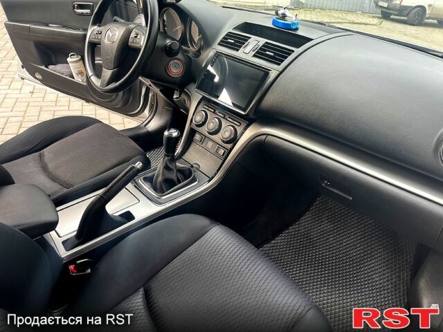 Серый Мазда 6, объемом двигателя 22 л и пробегом 295 тыс. км за 7299 $, фото 11 на Automoto.ua