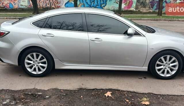 Серый Мазда 6, объемом двигателя 2.18 л и пробегом 277 тыс. км за 7700 $, фото 2 на Automoto.ua