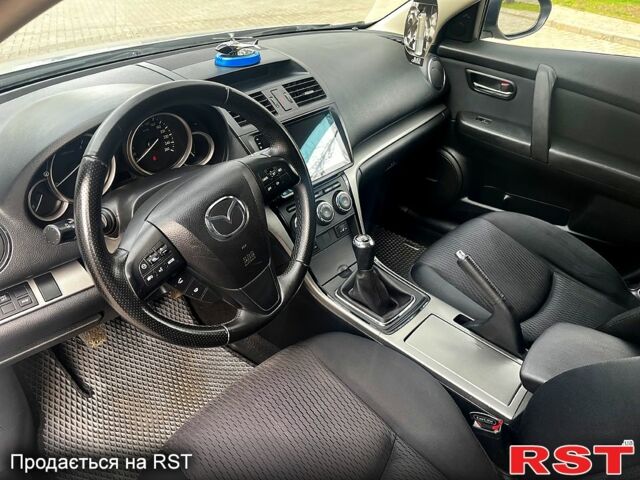 Серый Мазда 6, объемом двигателя 22 л и пробегом 295 тыс. км за 7299 $, фото 5 на Automoto.ua