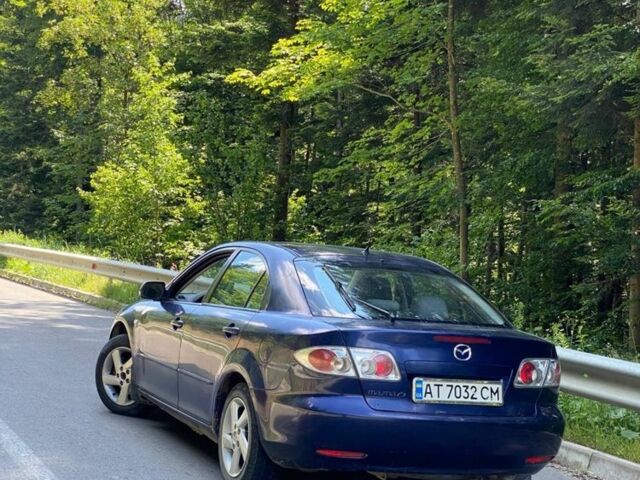 Синий Мазда 6, объемом двигателя 2 л и пробегом 250 тыс. км за 2299 $, фото 3 на Automoto.ua