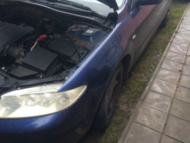 Синий Мазда 6, объемом двигателя 1.8 л и пробегом 360 тыс. км за 1100 $, фото 6 на Automoto.ua