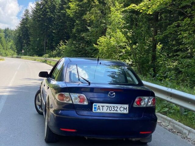 Синий Мазда 6, объемом двигателя 2 л и пробегом 250 тыс. км за 2299 $, фото 4 на Automoto.ua