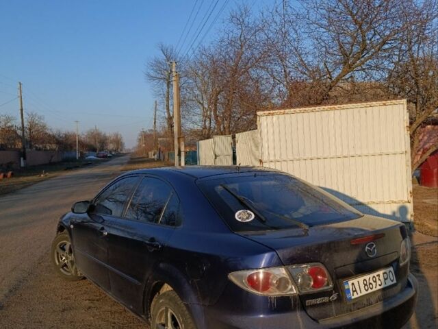 Синий Мазда 6, объемом двигателя 2 л и пробегом 450 тыс. км за 2700 $, фото 5 на Automoto.ua