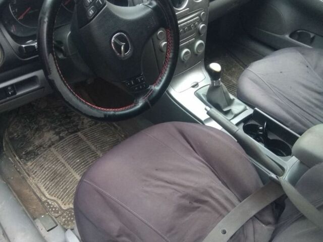 Синий Мазда 6, объемом двигателя 1.8 л и пробегом 360 тыс. км за 1100 $, фото 9 на Automoto.ua