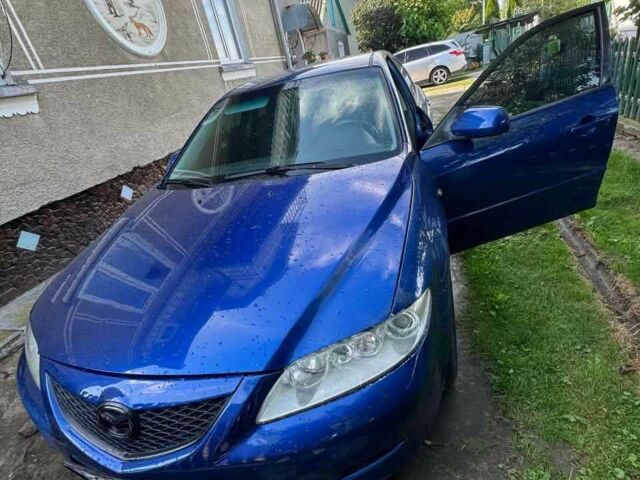 Синий Мазда 6, объемом двигателя 2 л и пробегом 250 тыс. км за 4002 $, фото 11 на Automoto.ua
