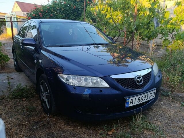Синий Мазда 6, объемом двигателя 2 л и пробегом 450 тыс. км за 2700 $, фото 4 на Automoto.ua