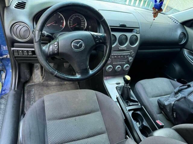Синий Мазда 6, объемом двигателя 2 л и пробегом 250 тыс. км за 4002 $, фото 8 на Automoto.ua
