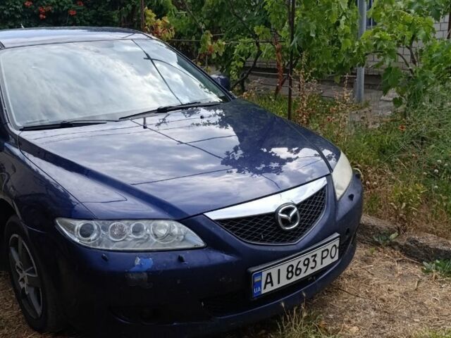 Синий Мазда 6, объемом двигателя 2 л и пробегом 450 тыс. км за 2700 $, фото 2 на Automoto.ua