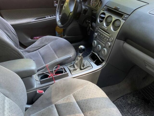Синий Мазда 6, объемом двигателя 2 л и пробегом 250 тыс. км за 2299 $, фото 12 на Automoto.ua