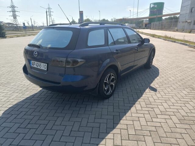 Синий Мазда 6, объемом двигателя 1.8 л и пробегом 220 тыс. км за 3799 $, фото 4 на Automoto.ua