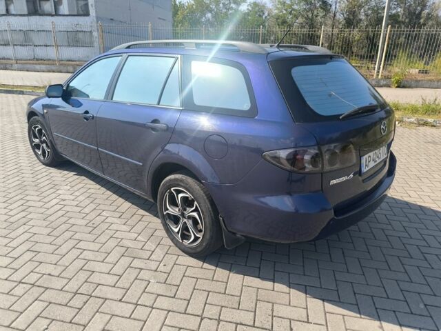 Синий Мазда 6, объемом двигателя 1.8 л и пробегом 220 тыс. км за 3799 $, фото 7 на Automoto.ua