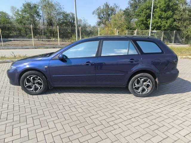 Синий Мазда 6, объемом двигателя 1.8 л и пробегом 220 тыс. км за 3799 $, фото 5 на Automoto.ua