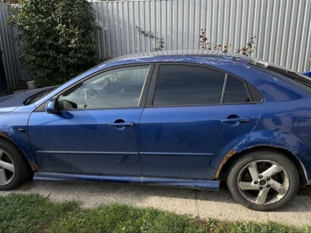 Синий Мазда 6, объемом двигателя 2 л и пробегом 320 тыс. км за 891 $, фото 1 на Automoto.ua