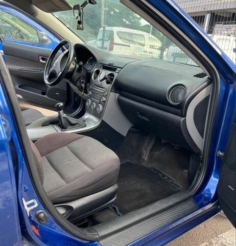 Синий Мазда 6, объемом двигателя 2 л и пробегом 290 тыс. км за 2608 $, фото 10 на Automoto.ua