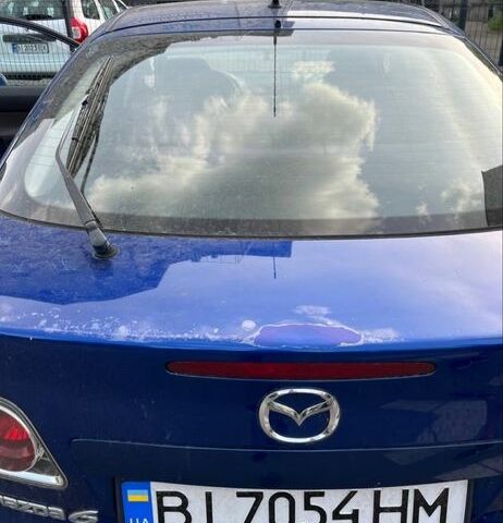 Синий Мазда 6, объемом двигателя 2 л и пробегом 290 тыс. км за 2608 $, фото 7 на Automoto.ua