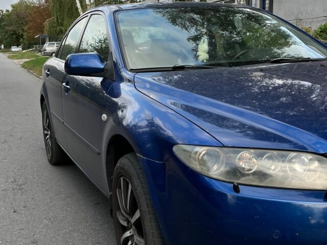 Синий Мазда 6, объемом двигателя 2.3 л и пробегом 300 тыс. км за 3500 $, фото 2 на Automoto.ua