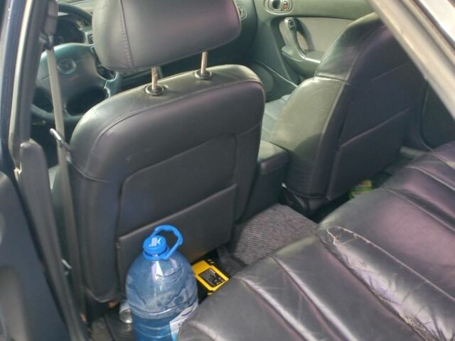 Синий Мазда 6, объемом двигателя 2 л и пробегом 240 тыс. км за 2700 $, фото 2 на Automoto.ua