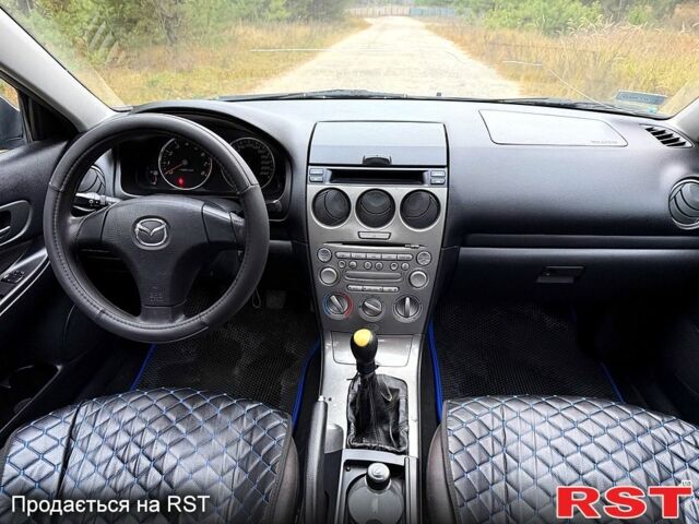 Синій Мазда 6, об'ємом двигуна 2 л та пробігом 247 тис. км за 3950 $, фото 11 на Automoto.ua