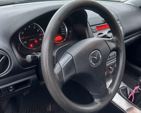 Синий Мазда 6, объемом двигателя 1.8 л и пробегом 168 тыс. км за 4800 $, фото 19 на Automoto.ua