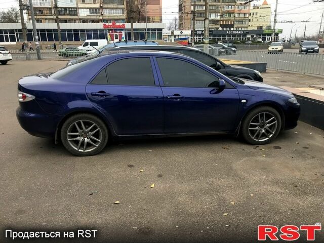 Синий Мазда 6, объемом двигателя 2 л и пробегом 230 тыс. км за 5000 $, фото 1 на Automoto.ua