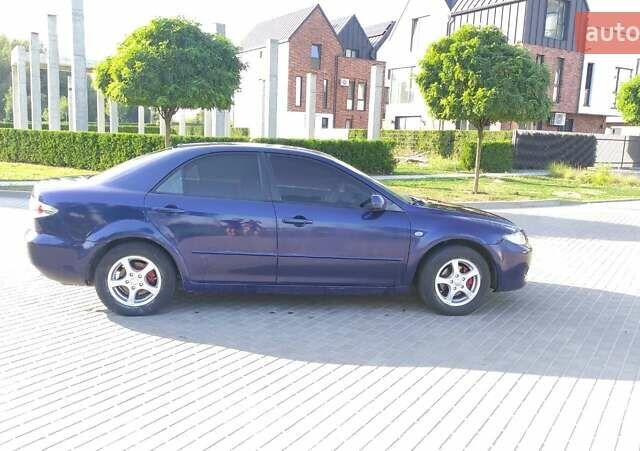 Синій Мазда 6, об'ємом двигуна 2 л та пробігом 220 тис. км за 2800 $, фото 4 на Automoto.ua