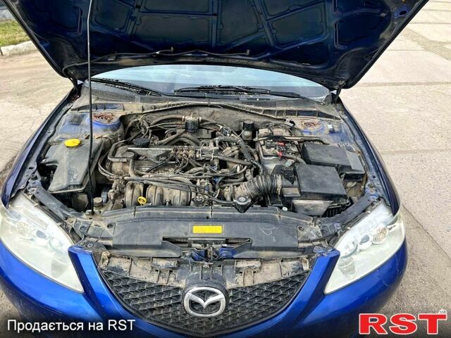 Синий Мазда 6, объемом двигателя 18 л и пробегом 200 тыс. км за 1800 $, фото 4 на Automoto.ua
