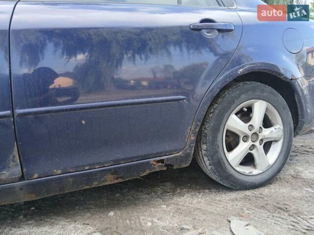 Синій Мазда 6, об'ємом двигуна 2 л та пробігом 304 тис. км за 2058 $, фото 25 на Automoto.ua