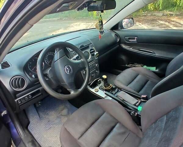 Синій Мазда 6, об'ємом двигуна 2 л та пробігом 304 тис. км за 2058 $, фото 3 на Automoto.ua