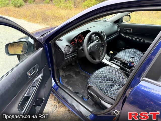 Синій Мазда 6, об'ємом двигуна 2 л та пробігом 247 тис. км за 3950 $, фото 9 на Automoto.ua