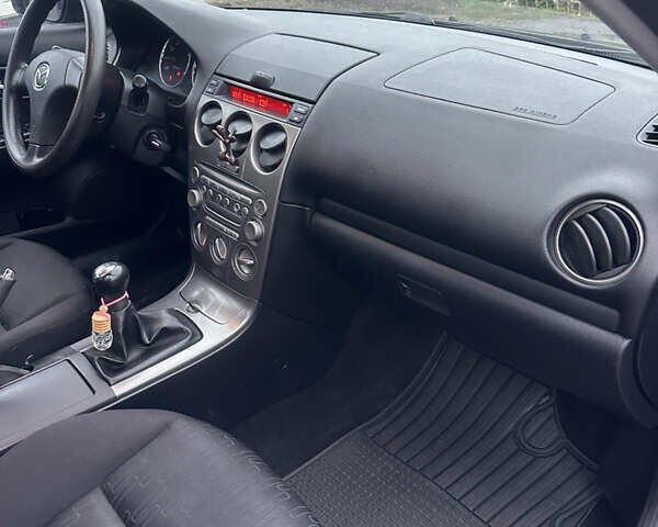 Синий Мазда 6, объемом двигателя 1.8 л и пробегом 168 тыс. км за 4800 $, фото 21 на Automoto.ua