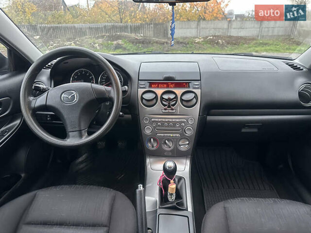 Синий Мазда 6, объемом двигателя 1.8 л и пробегом 168 тыс. км за 4800 $, фото 22 на Automoto.ua