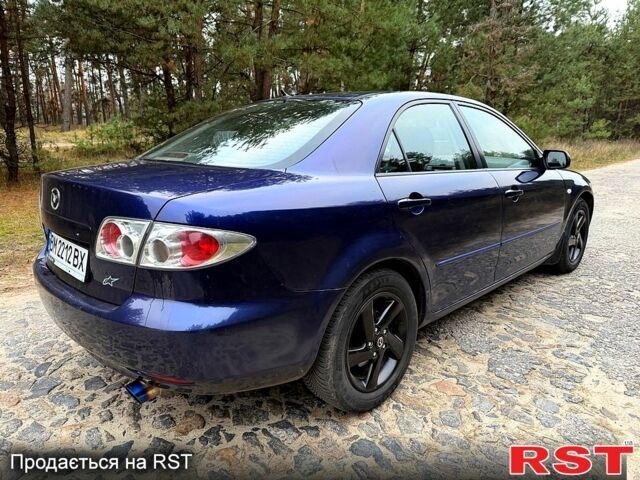 Синій Мазда 6, об'ємом двигуна 2 л та пробігом 247 тис. км за 3950 $, фото 2 на Automoto.ua