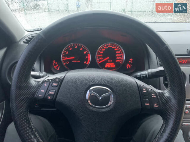 Синій Мазда 6, об'ємом двигуна 2.3 л та пробігом 257 тис. км за 5500 $, фото 12 на Automoto.ua